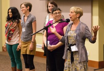 Kelly at the Power of Words conference while Caryn Mirriam-Goldberg, ronda Miller, Teri Grunthaner, and Seema Reza look on